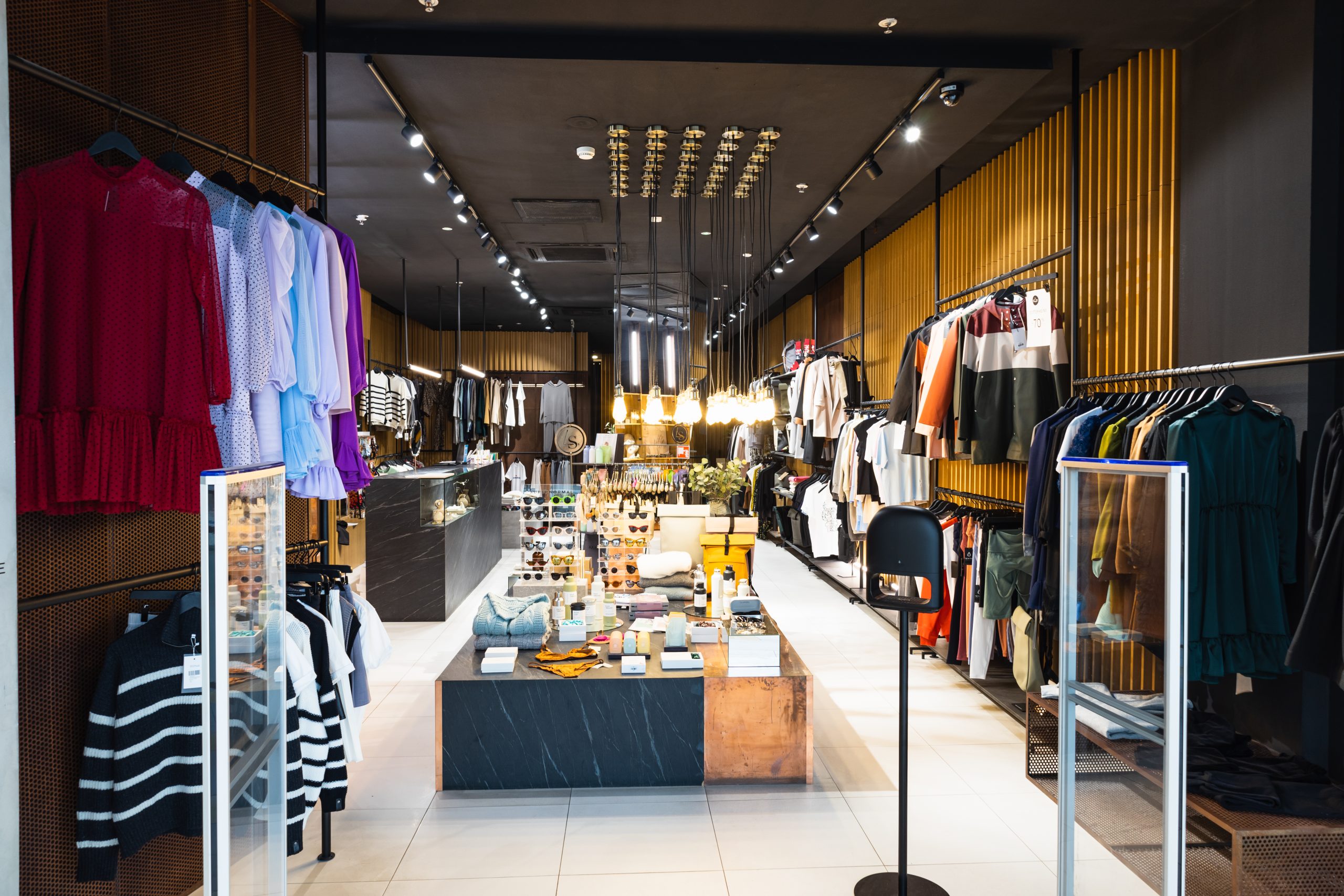 interior brand new fashion clothing store scaled